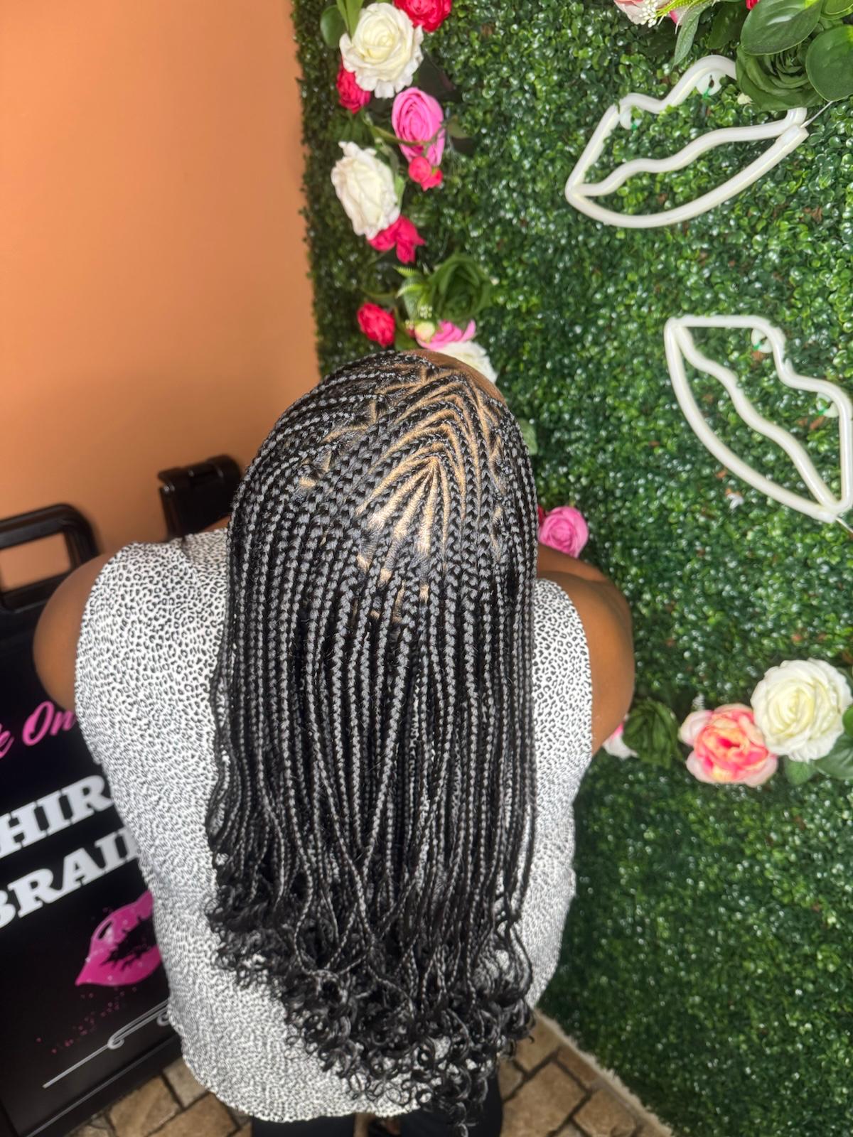Knotless braids with boho curl ends at Braids by estal